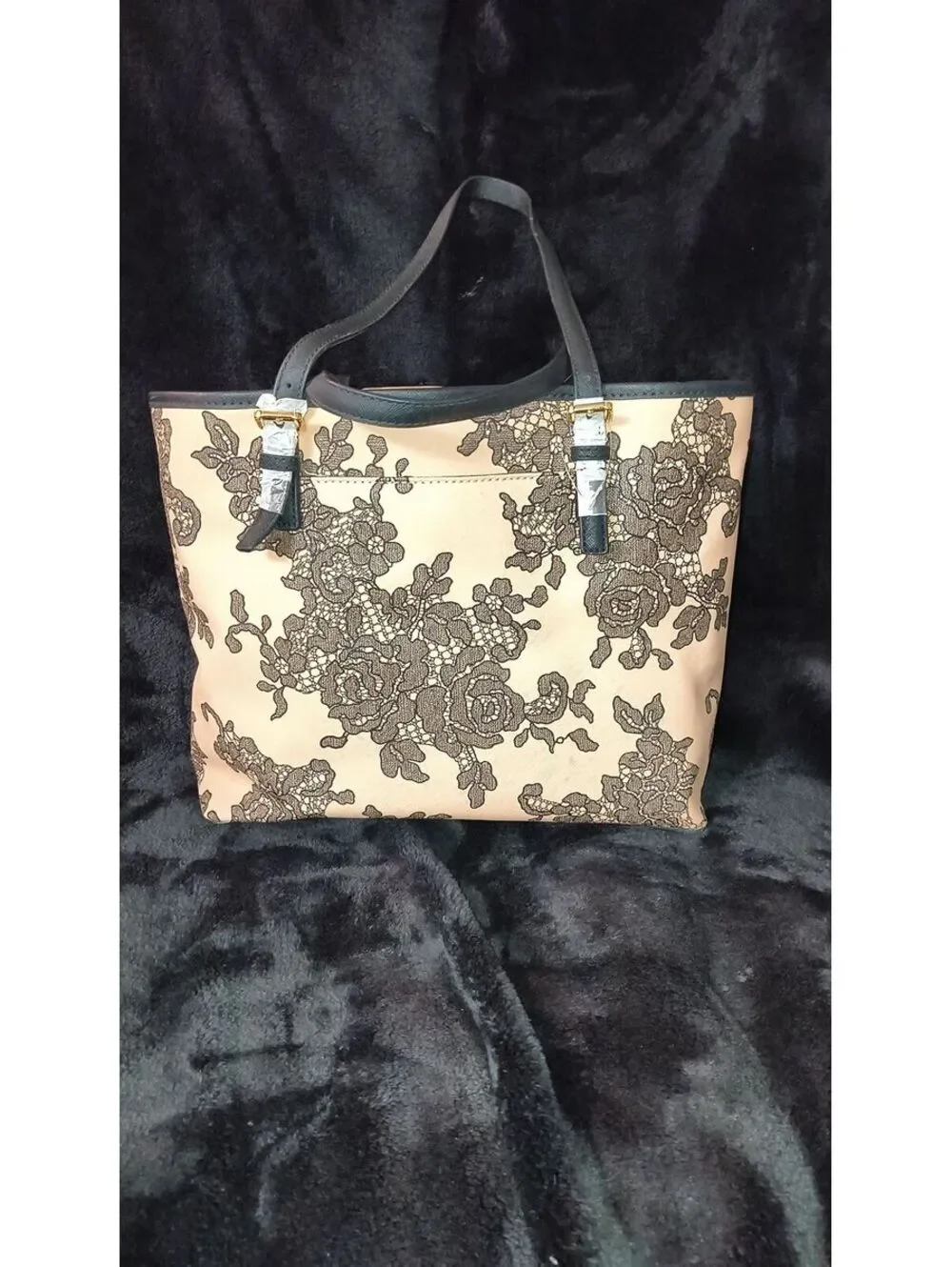Michael Kors pockets $298 made